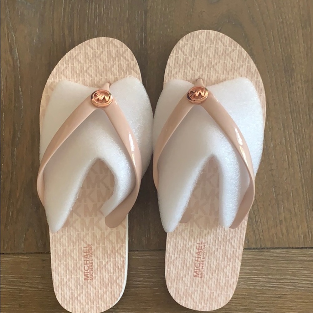 Brand new Michael Kors Flip flops